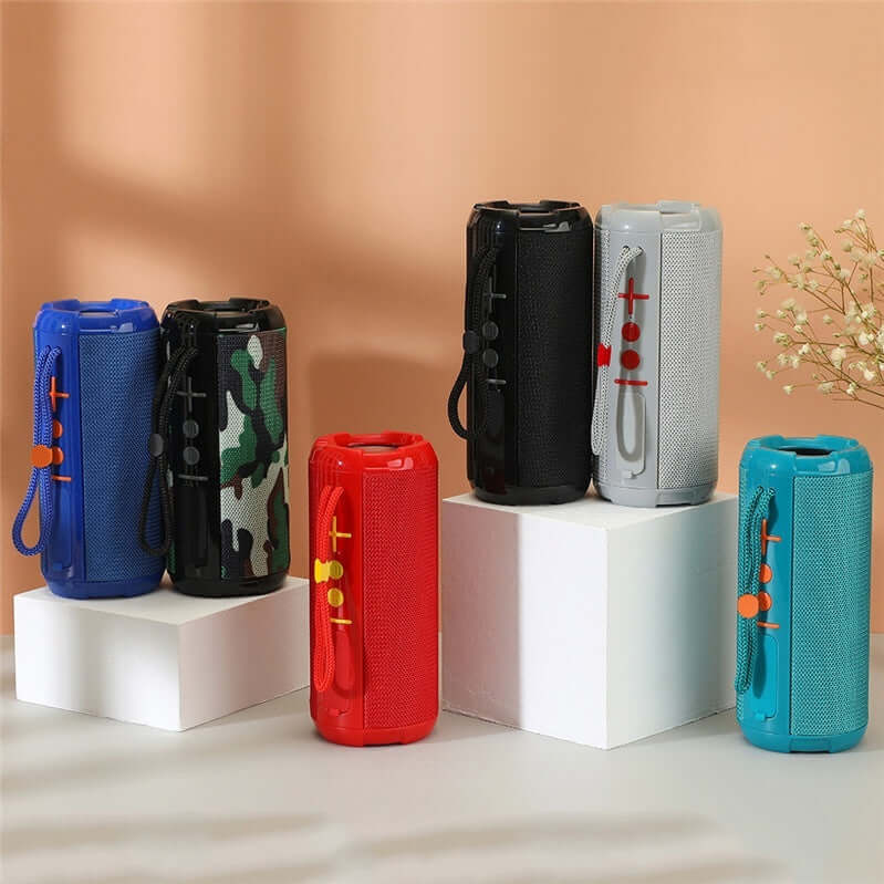 Portable Bluetooth Speaker collection in various colors on display, showcasing outdoor handheld audio devices.