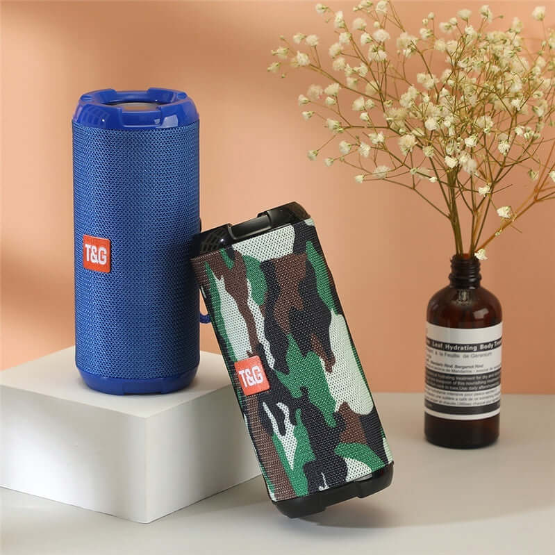 Portable Bluetooth Speaker collection in various colors on display, showcasing outdoor handheld audio devices.